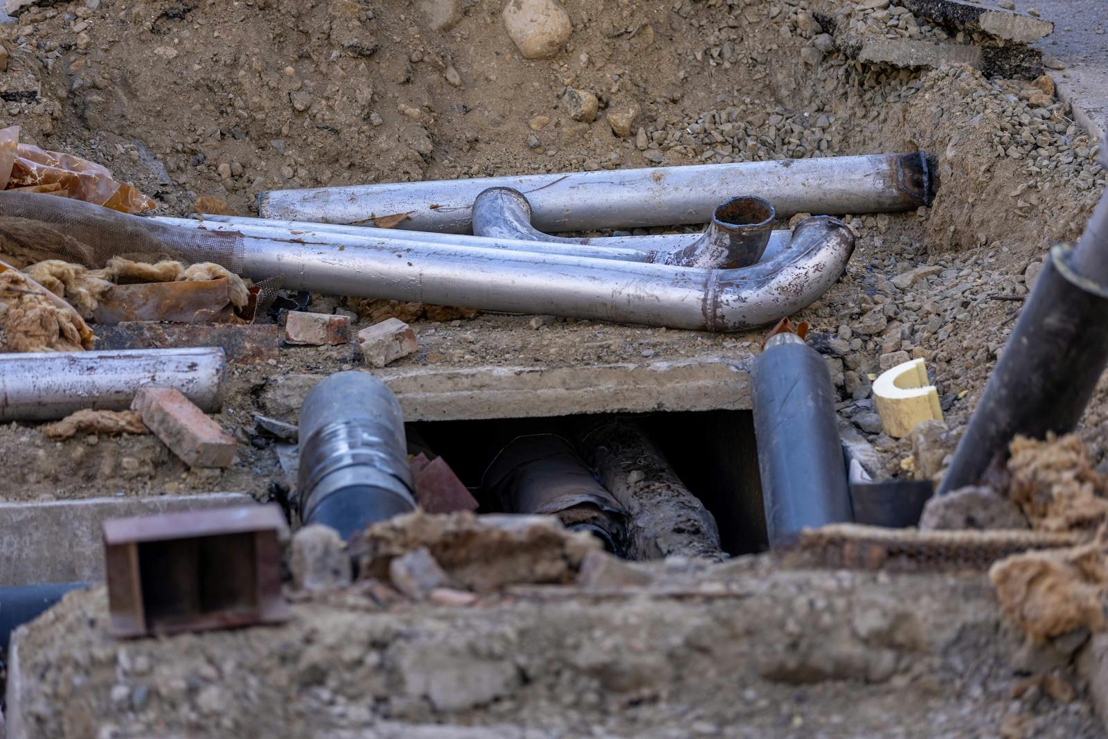 Utility pipe installation at a construction site